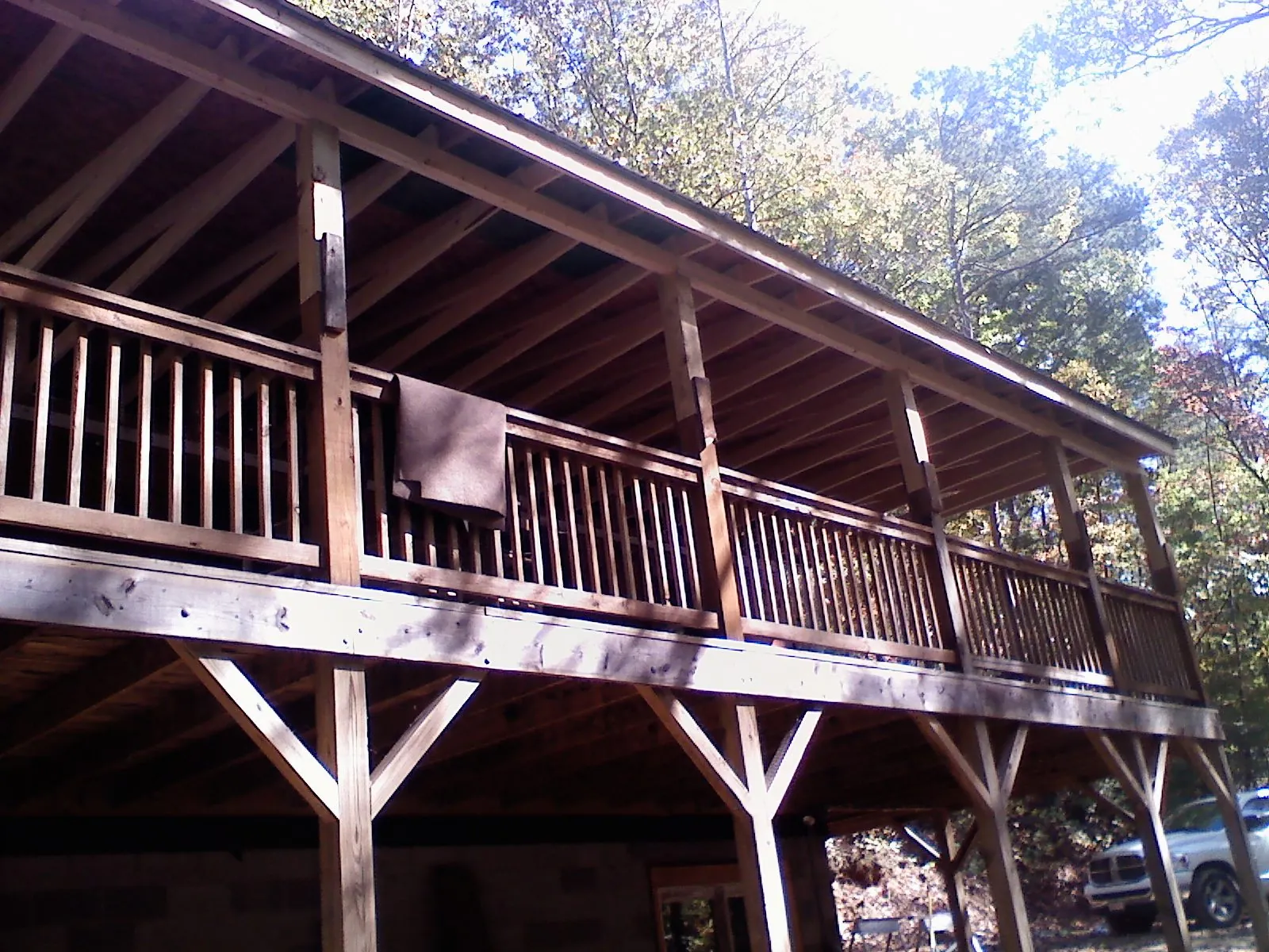 Timber framing under a new elevated porch and deck — Roof Leak Repair in Manchaca by Roofing Brothers